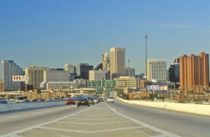 Photo of the Baltimore skyline and the freeway leading into the city
